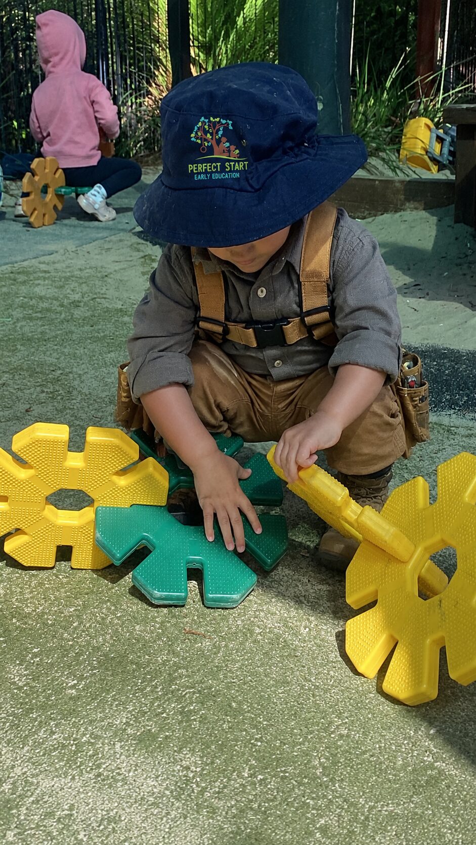Child Playing outdoors- building